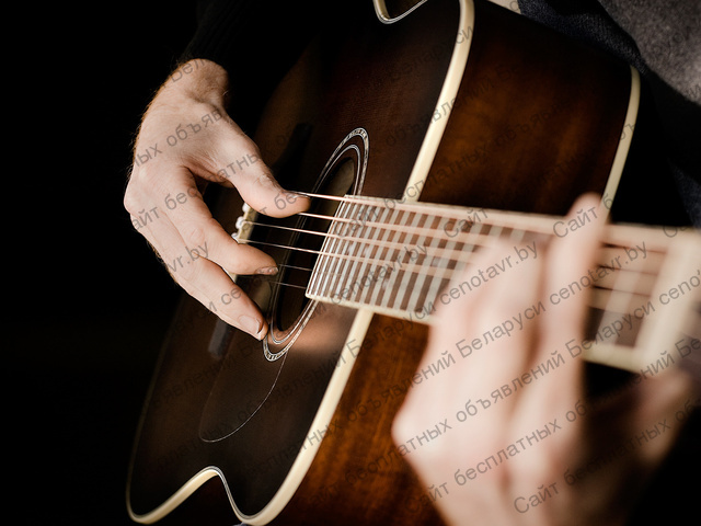 Фото: Обучение игре на гитаре